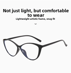 Detail of black cat-eye glasses frame with light blue anti-blue light coated lenses