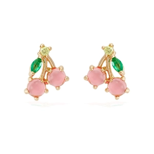 Macro shot of sweet cherry stud earrings with pink and green zircon stones on white background