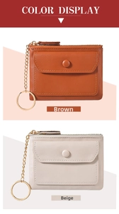 Detailed view of beige and brown leather mini wallets with keychains and gold zippers