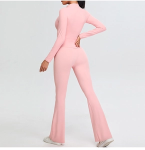 Slim fit pink yoga set with long sleeve mock neck top and flared gym leggings back view