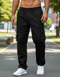 Detail view of men's black multi-pocket cargo pants with elastic waist and straight-leg fit