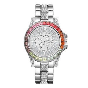 Detail of silver women's quartz watch with rainbow crystal bezel and diamond-set dial