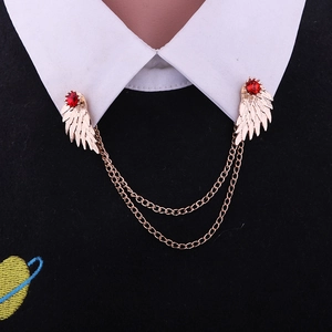 Vintage gold wing collar pins with red rhinestones and double chains on shirt
