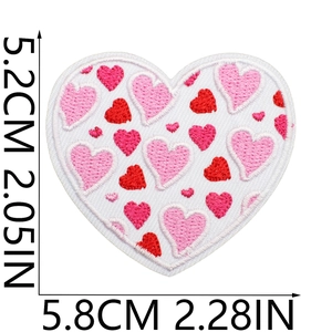 Detail showing heart monster embroidery patch with 5.8cm width and 5.2cm height dimensions