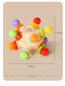 Detailed view of baby sensory toy showing dimensions of 10cm width and 6.5cm height