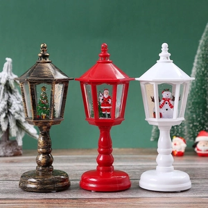 Lighted Christmas water lanterns with Santa, Snowman and Tree scenes on wood base