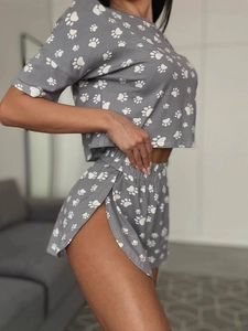 Women's two-piece loungewear set with crop top and paw print shorts in dark grey
