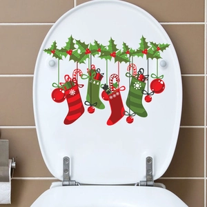 Christmas stocking and ornaments wall stickers on toilet lid with festive red and green patterns