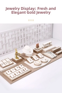 Luxurious jewelry display sets featuring necklaces, rings and gold rabbit figurines