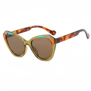 Cat eye oversized sunglasses with olive green frame and tortoiseshell textured temples