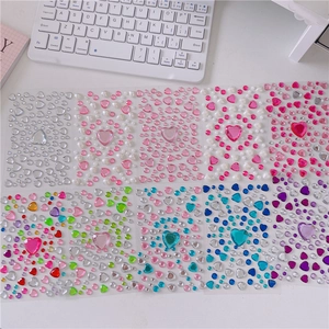 Detail of colorful acrylic heart gemstone stickers for DIY crafts and girl decoration