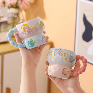 Hand-painted relief ceramic mugs with balloon patterns and creative beaded handles