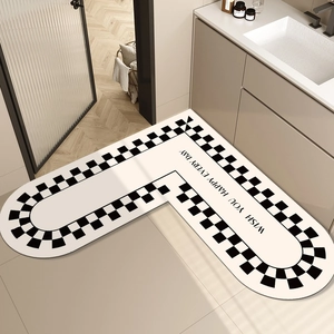 L-shaped absorbent bathroom mat with checkerboard border and positive quote