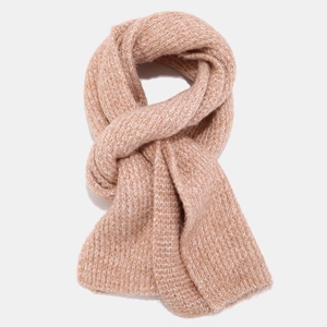 Detailed view of thick knit scarf texture in warm light brown for winter set