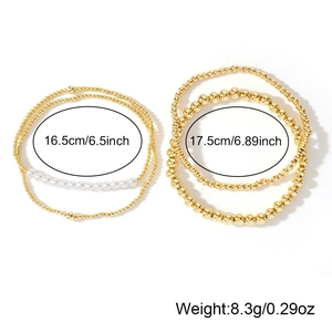 Detail view of gold bead and white pearl bracelet set with size and weight specs