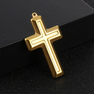 Polished gold stainless steel cross pendant necklace displayed on a black background