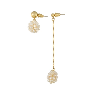 Asymmetric gold earrings with clusters of freshwater pearls and elegant chain drops