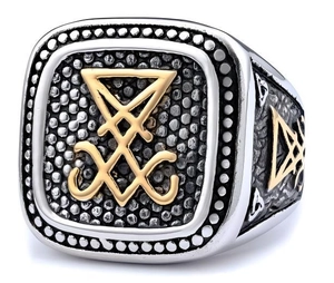 Macro detail of Sigil of Lucifer ring with gold face and stainless steel textured band