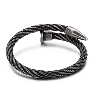 Industrial steel cable cuff bracelet with nail design and dark silver metallic finish