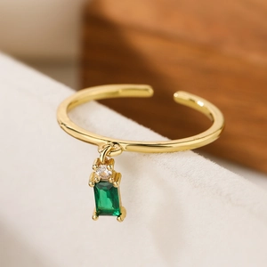 Minimalist gold-plated open ring with green rectangular zircon and clear accent stones