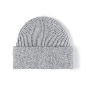 Gray chunky knit beanie for large head sizes featuring a textured fleece cuff for winter