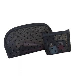 Two-piece black mesh cosmetic bag set with heart print featuring a large and small pouch