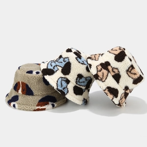 Fuzzy faux fur bucket hats with animal spots print for winter warmth in three colors