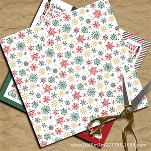 Close-up of Nutcracker Christmas scrapbooking paper with snowflakes and holiday patterns
