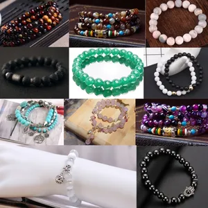 Assorted natural stone bead bracelets with tree of life and hamsa hand charms set