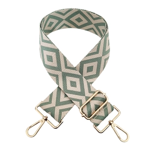 Detail of green diamond jacquard strap with polished gold-tone metal swivel hooks