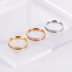 Sparkling triangle zircon full eternity rings in gold, rose gold and silver finishes