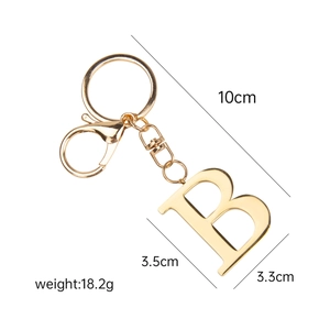 Golden stainless steel letter B keychain with lobster clasp and ring dimensions shown
