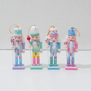 Set of 4 glittery wooden nutcracker soldier figurines in pastel colors for Xmas decor