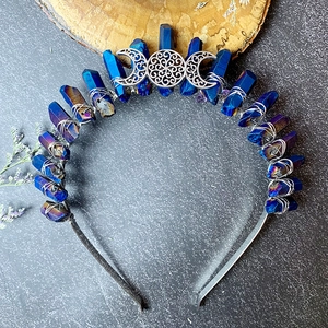 Detailed view of bohemian blue crystal moon crown with silver wire wrapping