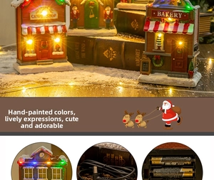 Detail of light-up Christmas resin houses showing battery and DC power options