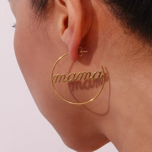 Chic golden large hoop earrings for women featuring cut-out mama letter charm design