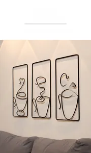 Three-piece black metal coffee cup wall art set for modern living room decor