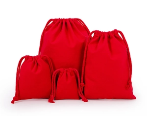 Set of four red cotton drawstring pouches in various sizes displayed on a white background