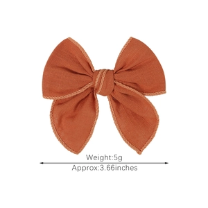 Handmade burnt orange linen bow hair clip for children, 3.66 inch solid fabric hairpins