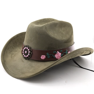 Detail of embroidered rose pattern on a moss green faux suede western cowboy hat band