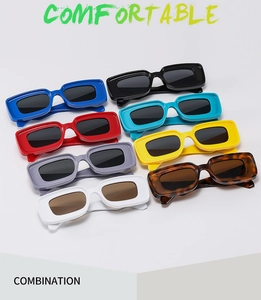 Detailed top view of eight trendy rectangle sunglasses in vibrant assorted colors