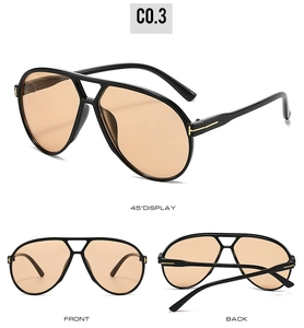 Detailed views of vintage aviator sunglasses featuring double bridge and golden T logo