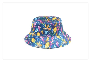 Detail view of ethnic floral print sun hat with colorful butterfly and tropical patterns