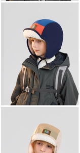 Detail of warm winter pilot hat for kids featuring fleece lining and ear protection flaps