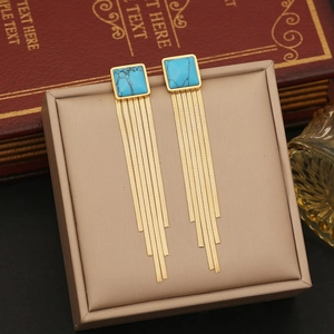 Long gold fringe earrings with turquoise square gemstone and sleek snake chains