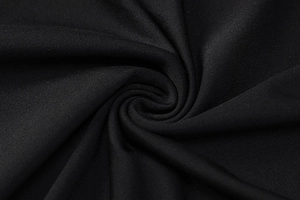 Macro shot of high-elastic black plain weave fabric showing soft texture and fine details