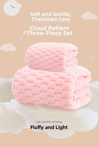 Macro detail of pink checkered cloud pattern towel with plush and thick 3D texture