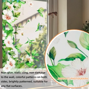 Detail of white hibiscus flower window sticker with green leaves and static cling film