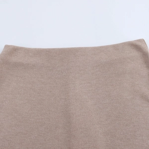 Detailed close-up showing the horizontal knit texture of the khaki knitted fabric set