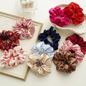 Elegant satin fabric scrunchies set with solid colors and floral patterns hair ties